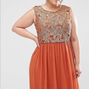Orange Dress Gold Flower Detailing.